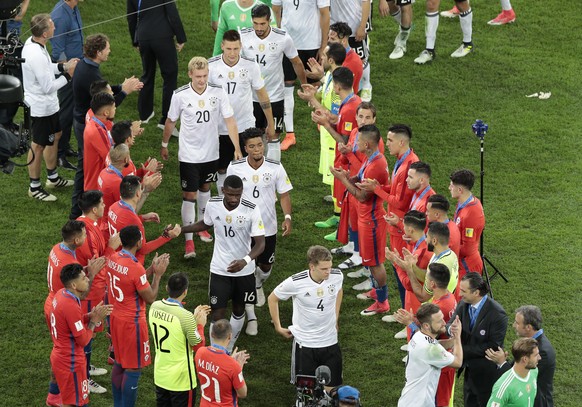 Chile&#039;s players applaud Germany&#039;s team after losing the Confederations Cup final soccer match between Chile and Germany, at the St.Petersburg Stadium, Russia, Sunday, July 2, 2017. (AP Photo ...