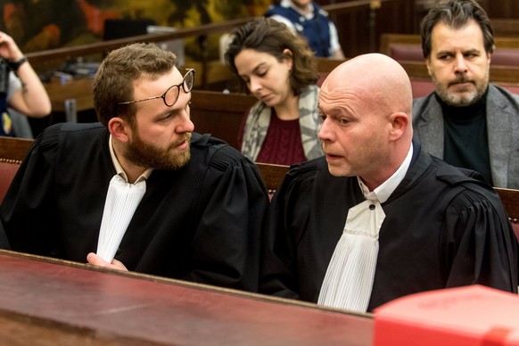 epa06497798 Belgian lawyers representing Paris attacks suspect Salah Abdeslam, Sven Mary (R) and Romain Delcoigne (L), speak with each other prior to the opening of the trial of terror suspects Salah  ...