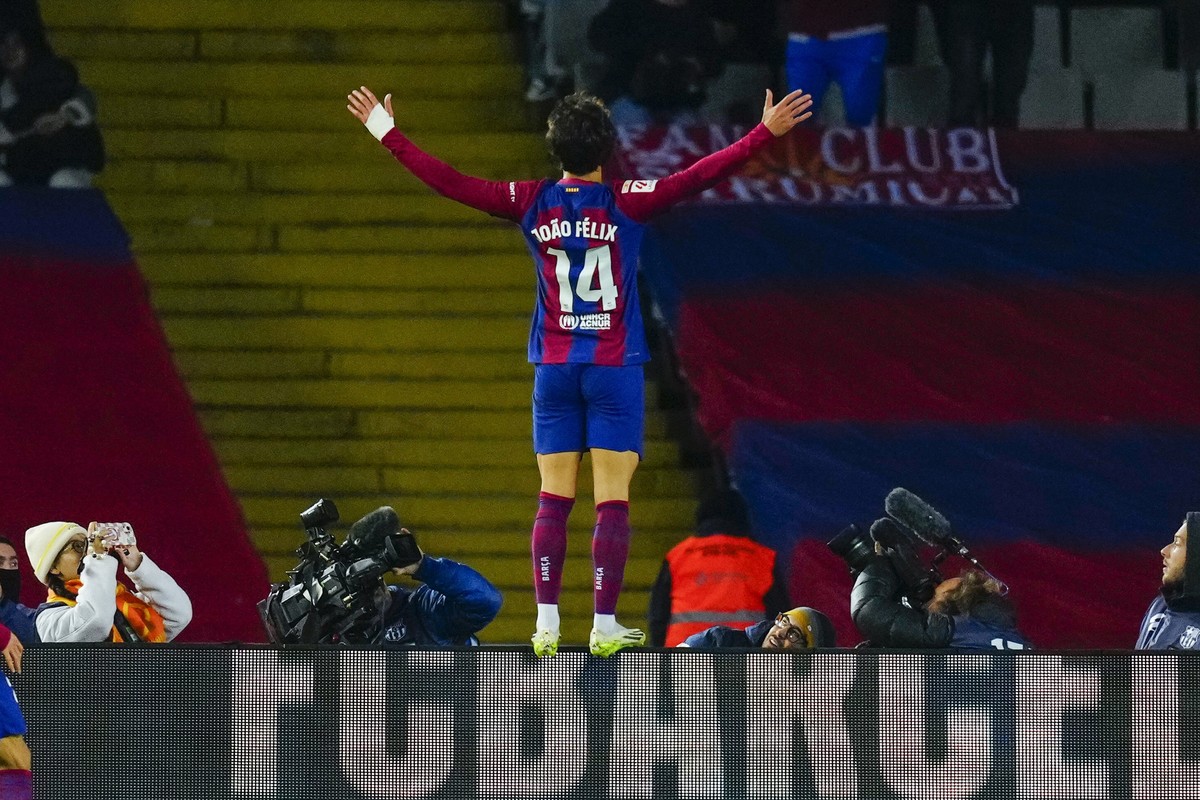 epaselect epa11009898 Barcelona's forward Joao Felix celebrates after scoring the 1-0 goal during the Spanish LaLiga soccer match between FC Barcelona and Atletico de Madrid, in Barcelona, Spain, ...
