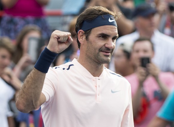 Roger Federer, of Switzerland, celebrates his 4-6, 6-4, 6-2 victory over David Ferrer, of Spain, at the Rogers Cup tennis tournament Thursday, Aug. 10, 2017, in Montreal. (Paul Chiasson/The Canadian P ...