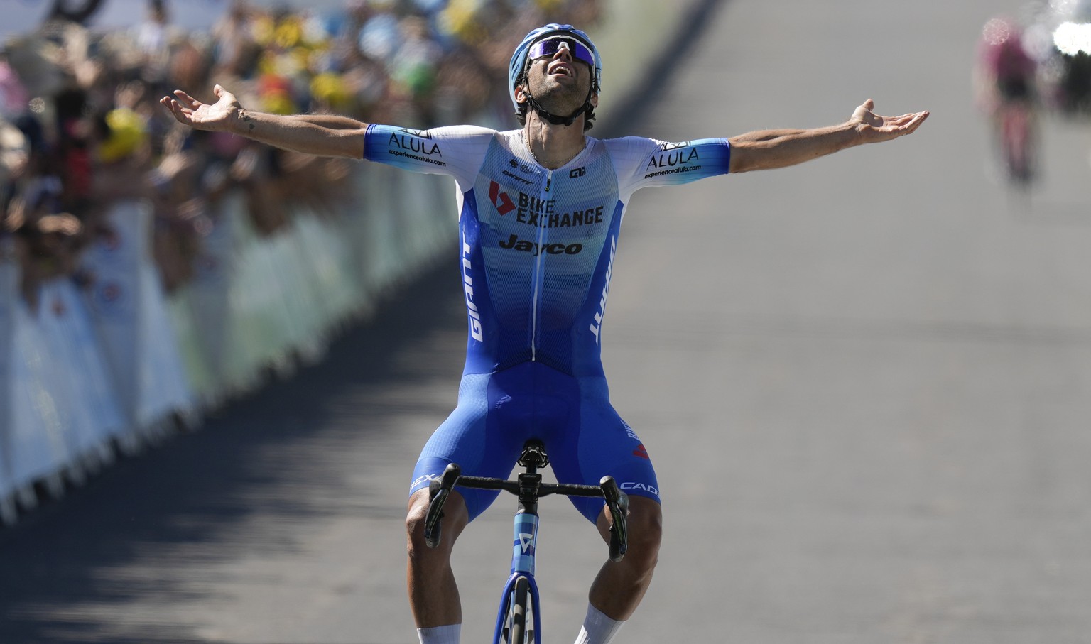 Stage winner Australia&#039;s Michael Matthews celebrates as he crosses the finish line to win the fourteenth stage of the Tour de France cycling race over 192.5 kilometers (119.6 miles) with start in ...