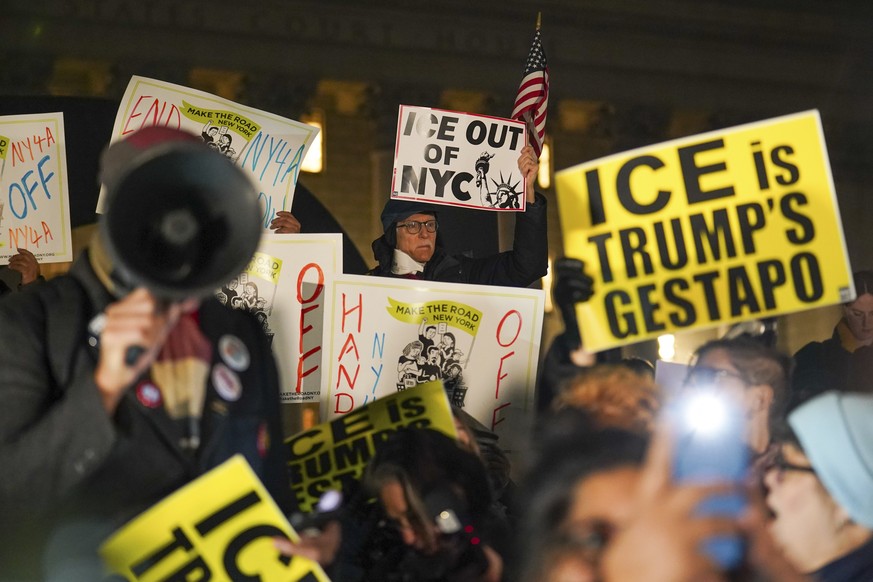 People participate in a protest in response to the fatal shooting of Renee Nicole Good by a Federal immigration officer this morning in Minneapolis, Wednesday, Jan. 7, 2026, in New York. (AP Photo/Rya ...