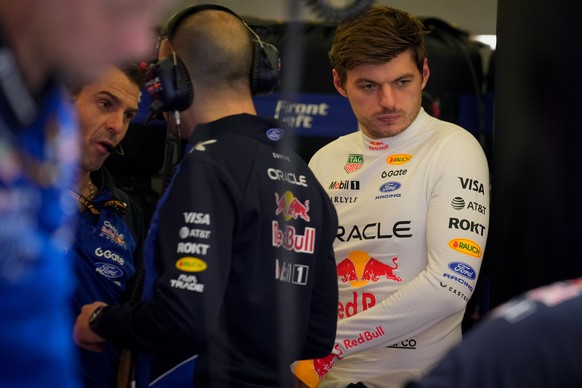 Red Bull driver Max Verstappen of the Netherlands looks on as mechanics prepare his car during the third day of Formula One pre-season test at the Bahrain International Circuit in Sakhir, Bahrain, Fri ...