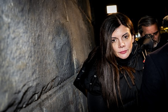 epa12668384 Jessica Moretti (L), French owner of the bar in Crans-Montana, where the deadly fire happened on New Year's Day, leaves the Valais public prosecutor's office in Sion, Switzerland ...