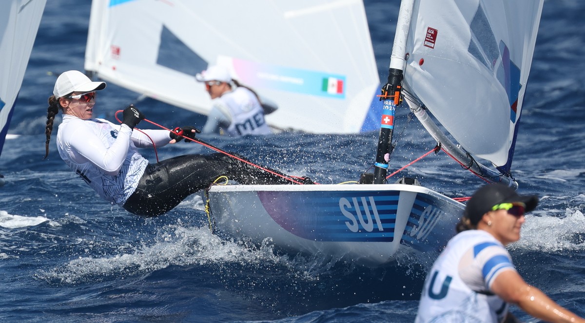 epa11526000 Maud Jayet of Switzerland during the Women's Dinghy ILCA 6 class opening series race of the Sailing competitions in the Paris 2024 Olympic Games, at the Marseille Marina in Marseille, ...