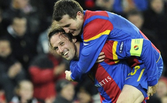 Basel&#039;s Marco Streller, left, and Basel&#039;s Alexander &quot;Alex&quot; Frei, right, celebrate after the UEFA Champions League Group C soccer match between Switzerland&#039;s FC Basel and Engla ...