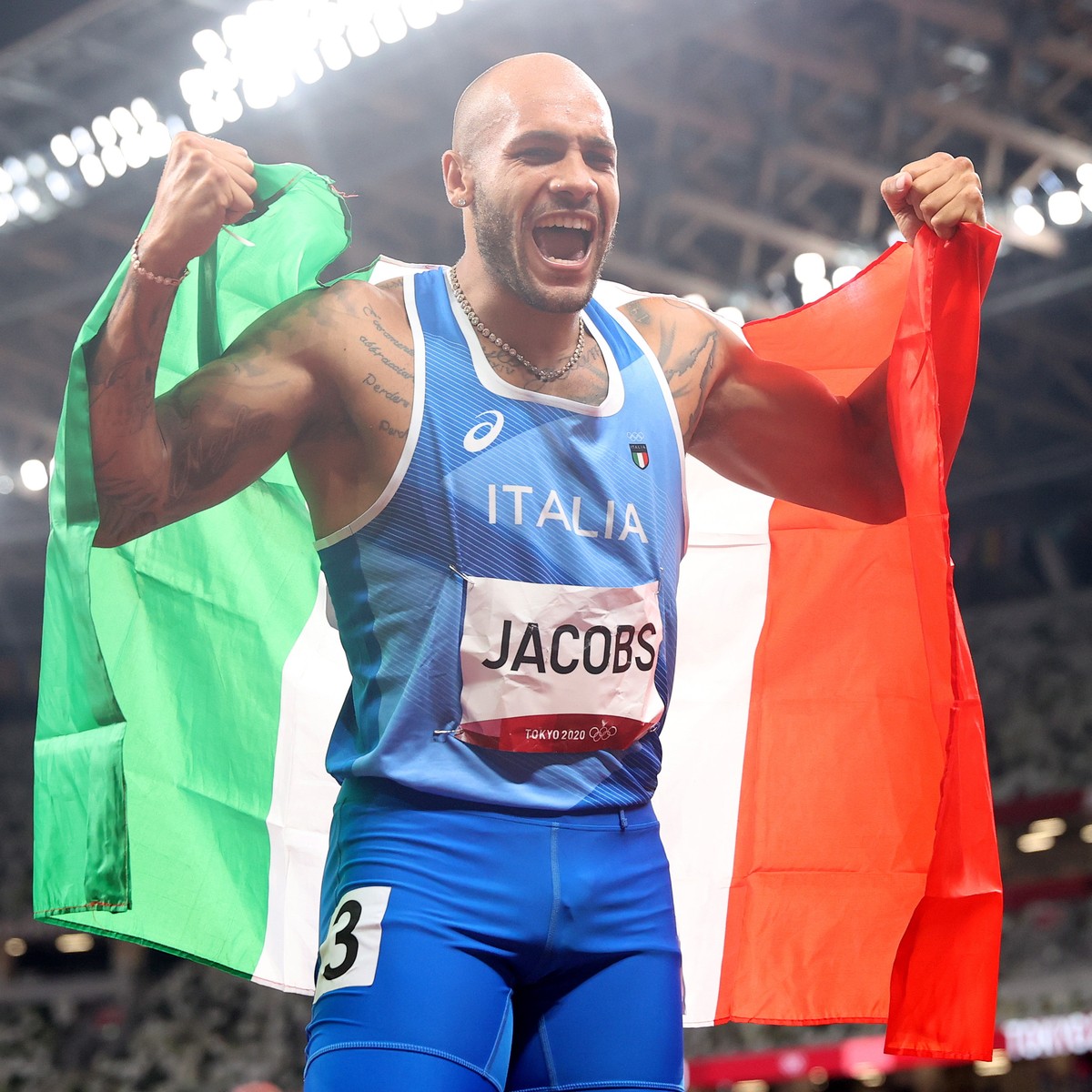 epa09385552 Lamont Marcell Jacobs of Italy celebrates winning the Men's 100m final at the Athletics events of the Tokyo 2020 Olympic Games at the Olympic Stadium in Tokyo, Japan, 01 August 2021.  ...