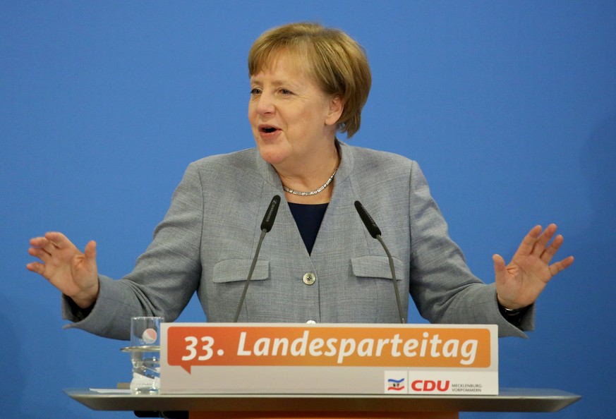 epa06349507 German Chancellor and leader of the German Christian Democratic Party (CDU), Angela Merkel, speaks during a party convention of the CDU of Mecklenburg-Western Pomerania in Kuehlungsborn, n ...