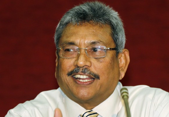 FILE -This Jan. 24, 2013, file photo shows Sri Lankan Defense Secretary Gotabhaya Rajapaksa talking to media in Colombo, Sri Lanka. A new U.N. investigation into allegations of war crimes in Sri Lanka ...