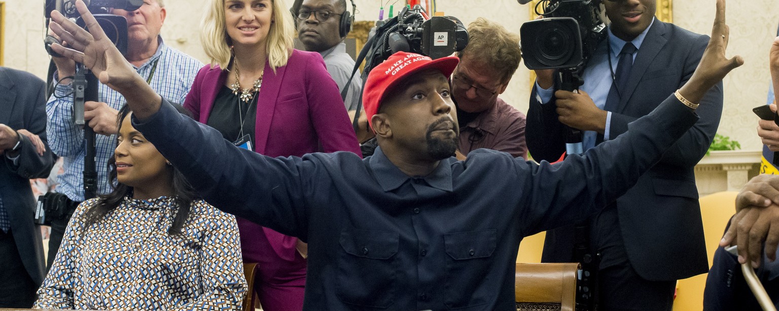 epa08528693 (FILE) - US entertainer Kanye West (C) speaks to members of the news media during a meeting with US President Donald J. Trump, in the Oval Office of the White House in Washington, DC, USA, ...