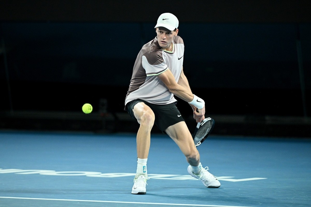 epa11110091 Jannik Sinner of Italy in action during the Men's Singles final against Daniil Medvedev of Russia on Day 15 of the Australian Open tennis tournament in Melbourne, Australia, 28 Januar ...