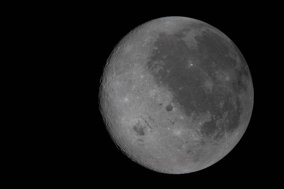 260406 -- WASHINGTON, April 6, 2026 -- Photo taken on April 6, 2026 shows the Moon seen from the Orion spacecraft. The crew of the Artemis II mission on Monday broke the record for the farthest distan ...