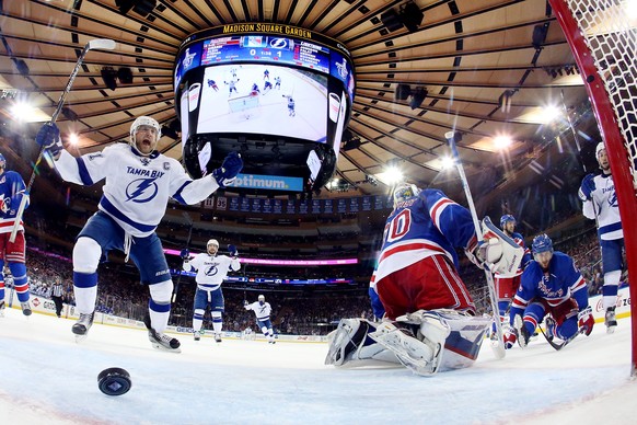 NEW YORK, NY - MAY 24: Steven Stamkos #91 of the Tampa Bay Lightning celebrates after scoring a goal against Henrik Lundqvist #30 of the New York Rangers during the second period in Game Five of the E ...