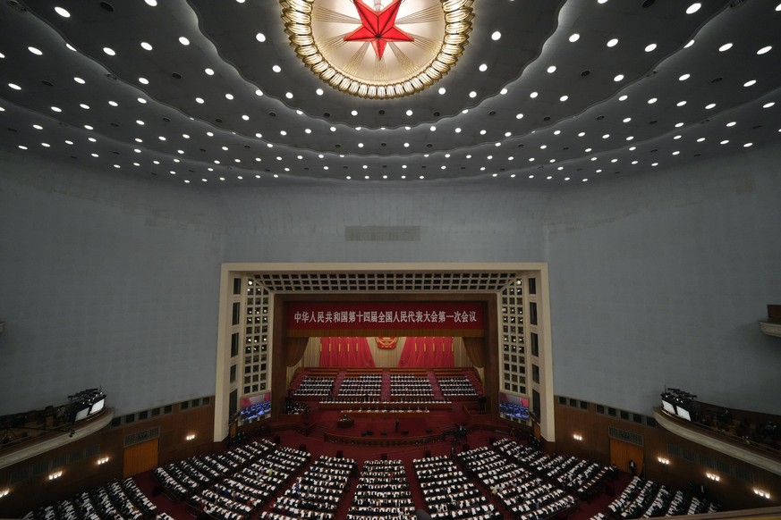 Delegates attend a session of China&#039;s National People&#039;s Congress (NPC) at the Great Hall of the People in Beijing, Tuesday, March 7, 2023. (AP Photo/Ng Han Guan)