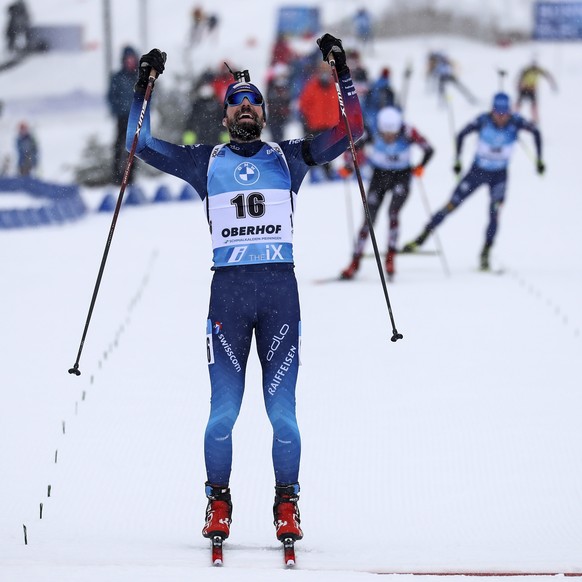 Benjamin Weger of Switzerland finishes on the third place during the men&#039;s 15km mass start race at the Biathlon World Cup in Oberhof, Germany, Sunday, Jan. 17, 2021. (AP Photo/Matthias Schrader)