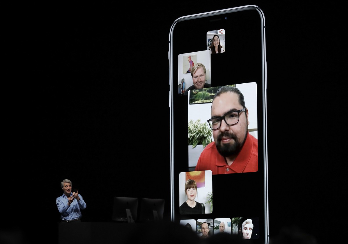 Craig Federighi, Apple's senior vice president of Software Engineering, speaks about group FaceTime during an announcement of new products at the Apple Worldwide Developers Conference Monday, Jun ...