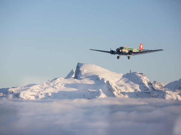 HANDOUT - Undated pic of a JU-52 aircraft of the JU-AIR in the air. A JU-52 of the JU-AIR crashed on Saturday afternoon, 04 August 2018 at Piz Segnas above Flims, Switzerland. Swiss police say all 20  ...