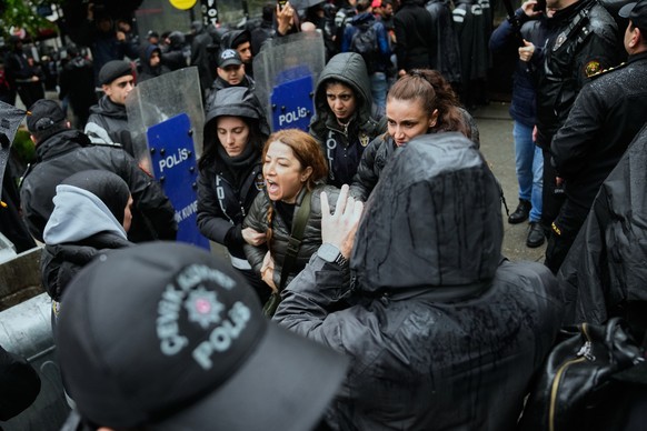 Union members are detained by Turkish police officers as they try to march towards Taksim square in Istanbul, Turkey, Friday, May 1, 2026, during Labor Day celebrations. (AP Photo/Khalil Hamra)
Turkey ...