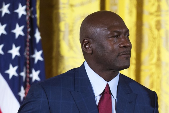 epa08457583 (FILE) - Former NBA star Michael Jordan receives the Presidential Medal of Freedom during a ceremony in the White House in Washington, DC, USA, 22 November 2016 (re-issued on 01 June 2020) ...