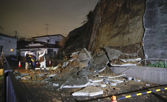 A collapsed section of a cliff is seen in Shiogama, Miyagi Prefecture, northern Japan Saturday March 20, 2021, after a powerful earthquake struck northeastern Japan. A strong earthquake struck Saturda ...