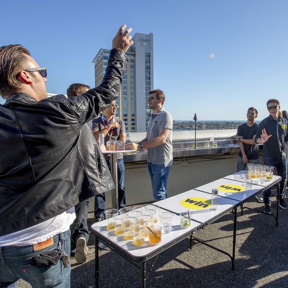Beer Pong IMAGE DISTRIBUTED FOR BUZZFEED - Guests play beer pong BuzzFeed Superpower Hour presented by CW at Altitude Rooftop Bar at the Marriott on Friday, July 10, 2015, in San Diego, CA. (Photo by Christy Radecic/Invision for Buzzfeed/AP Images)