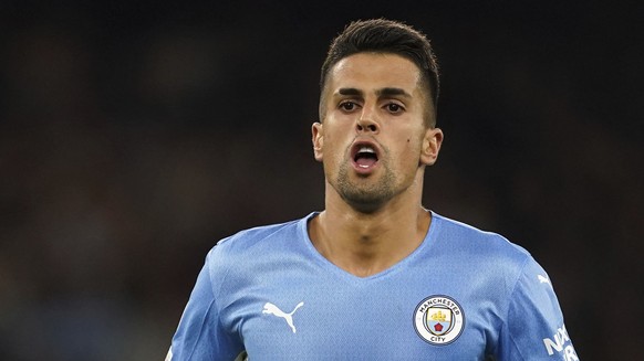 Manchester City&#039;s Joao Cancelo celebrates scoring during the Champions League Group A soccer match between Manchester City and RB Leipzig at the Etihad Stadium, Manchester, England, Wednesday Sep ...