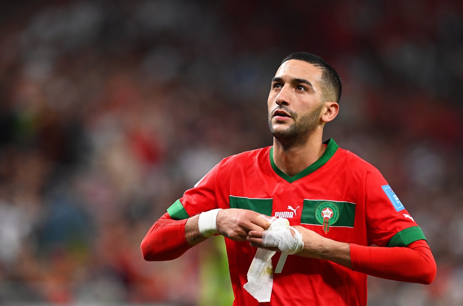 epa10359552 Hakim Ziyech of Morocco reacts as he leaves the pitch during the FIFA World Cup 2022 quarter final soccer match between Morocco and Portugal at Al Thumama Stadium in Doha, Qatar, 10 Decemb ...