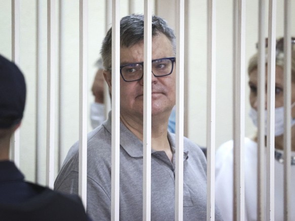 FILE - Viktor Babariko, the former head of Russia-owned Belgazprombank, stands inside a cage in a court room in Minsk, Belarus, Tuesday, July 6, 2021. For nearly three years, a harsh crackdown on diss ...