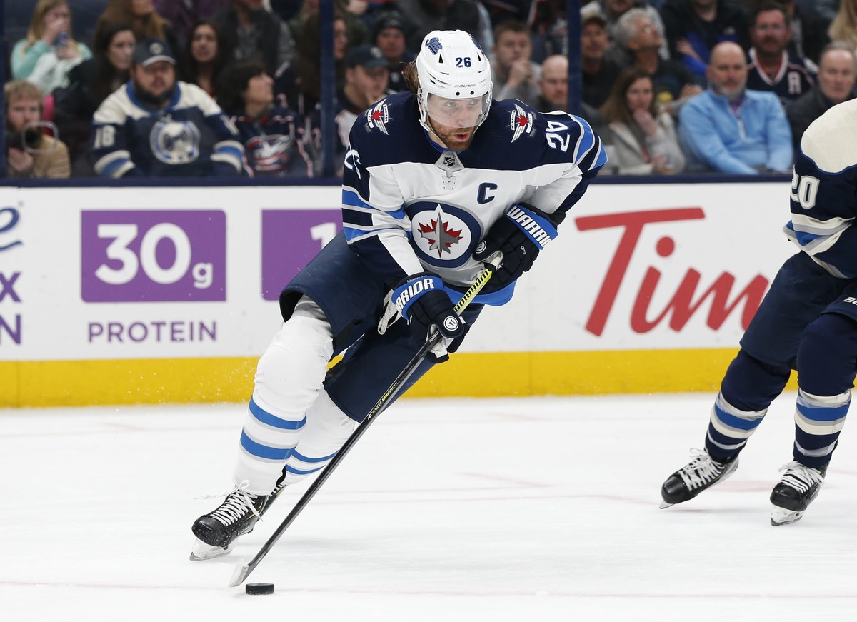 FILE - In this Jan. 22, 2020, file photo, Winnipeg Jets' Blake Wheeler plays against the Columbus Blue Jackets during an NHL hockey game in Columbus, Ohio. Wheeler and the Winnipeg Jets would hav ...