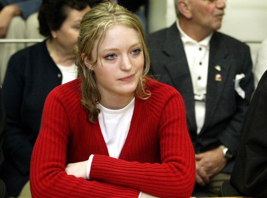FILE - This is a Tuesday, April 20, 2004 file photo of Sabine Dardenne looks across the room as she waits for proceedings to begin at the Palace of Justice in Arlon, Belgium. The testimony of victim L ...