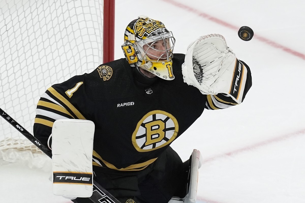 FILE - Boston Bruins' Jeremy Swayman makes a glove save during the third period in Game 6 of an NHL hockey Stanley Cup second-round playoff series against the Florida Panthers, May 17, 2024, in B ...