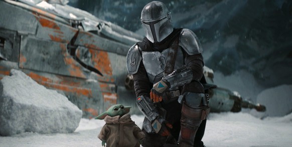 This image released by Disney+ shows Pedro Pascal in a scene from &quot;The Mandalorian.&quot; Jon Favreau is set to direct the film ?The Mandalorian &amp; Grogu? which will go into production this ye ...