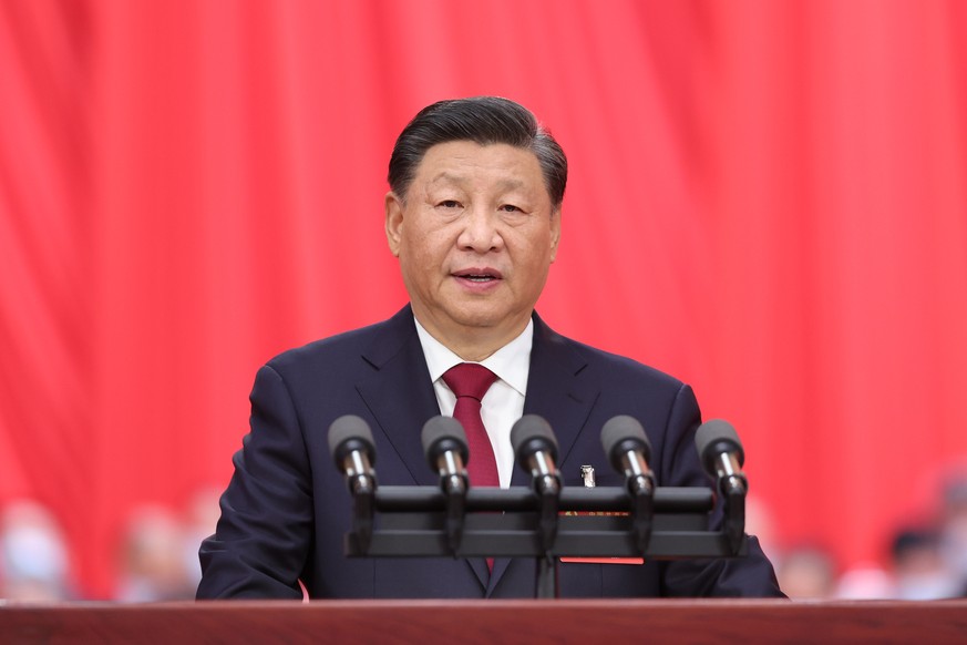 epa10246553 Chinese President Xi Jinping delivers a report to the 20th National Congress of the Communist Party of China (CPC) on behalf of the 19th CPC Central Committee at the Great Hall of the Peop ...