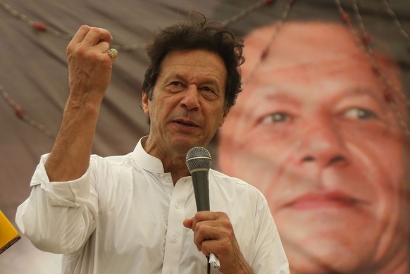 epa06864613 Imran Khan, head of Pakistan Tehrik-e-Insaf political party, speaks to supporters as the country prepares for general elections, in Karachi, Pakistan, 04 July 2018. Pakistan holds…