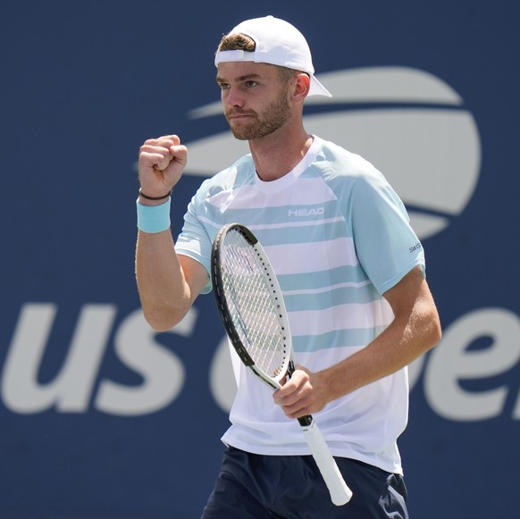 Jerome Kym, of Switzerland, returns a shot to Brandon Nakashima, of the United States, during the second round of the U.S. Open tennis championships, Wednesday, Aug. 27, 2025, in New York. (AP Photo/S ...