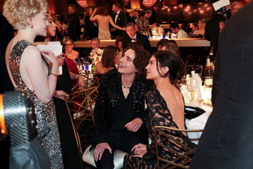 Julia Garner, Timothée Chalamet and Kylie Jenner at the 81st Golden Globe Awards held at the Beverly Hilton Hotel on January 7, 2024 in Beverly Hills, California. (Photo by Christopher Polk/Golden Glo ...