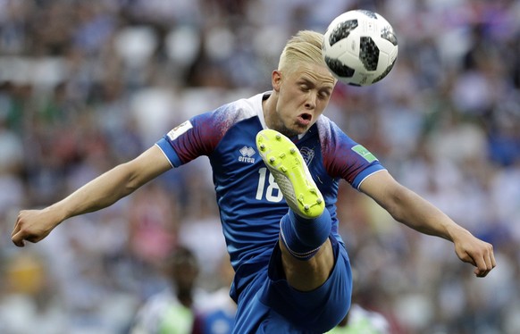 Iceland&#039;s Hordur Magnusson goes for the ball during the group D match between Nigeria and Iceland at the 2018 soccer World Cup in the Volgograd Arena in Volgograd, Russia, Friday, June 22, 2018.  ...