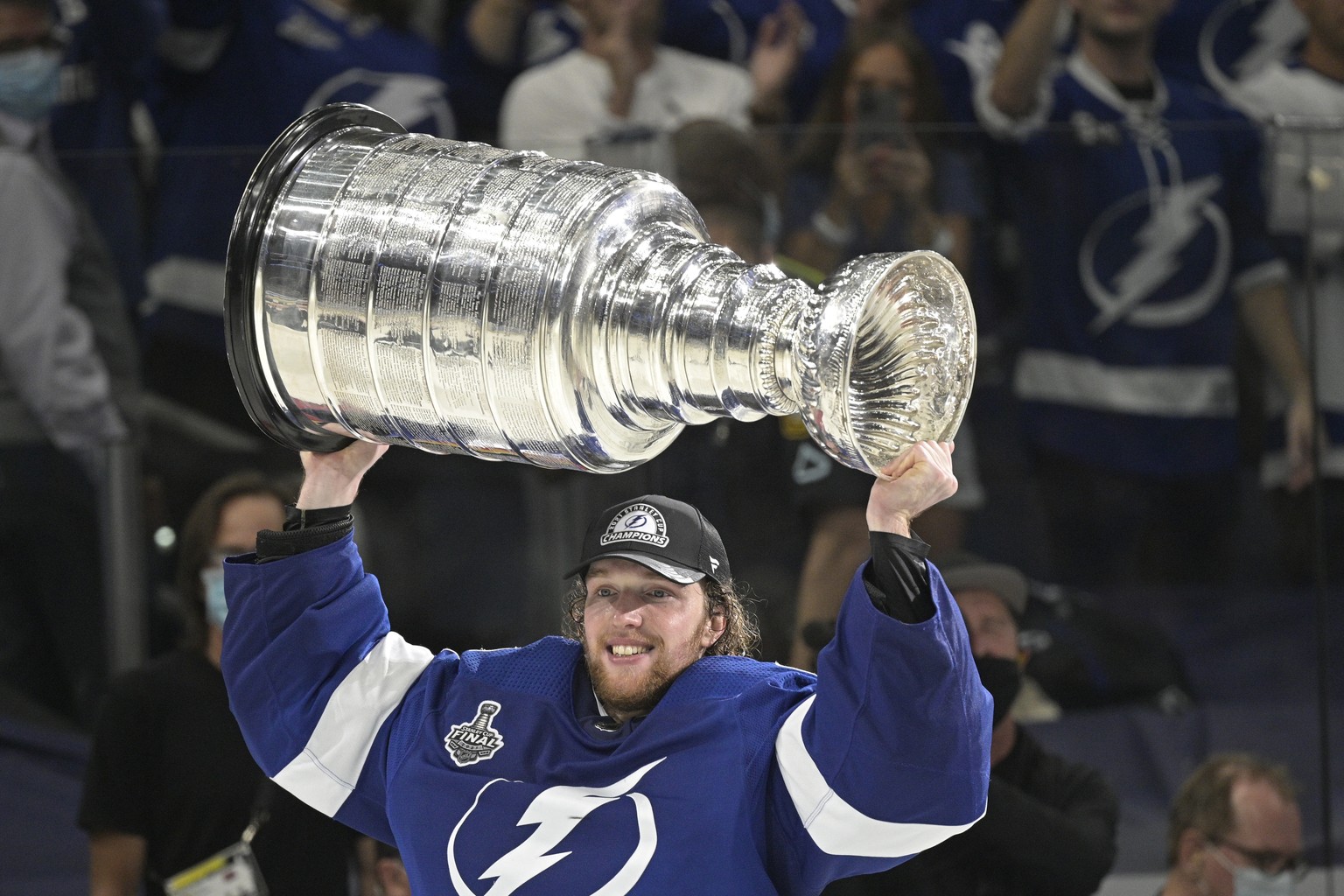 Tampa Bay Lightning goaltender Andrei Vasilevskiy hoists the Stanley Cup after the team defeated the Montreal Canadiens in Game 5 of the NHL hockey Stanley Cup finals, Wednesday, July 7, 2021, in Tamp ...