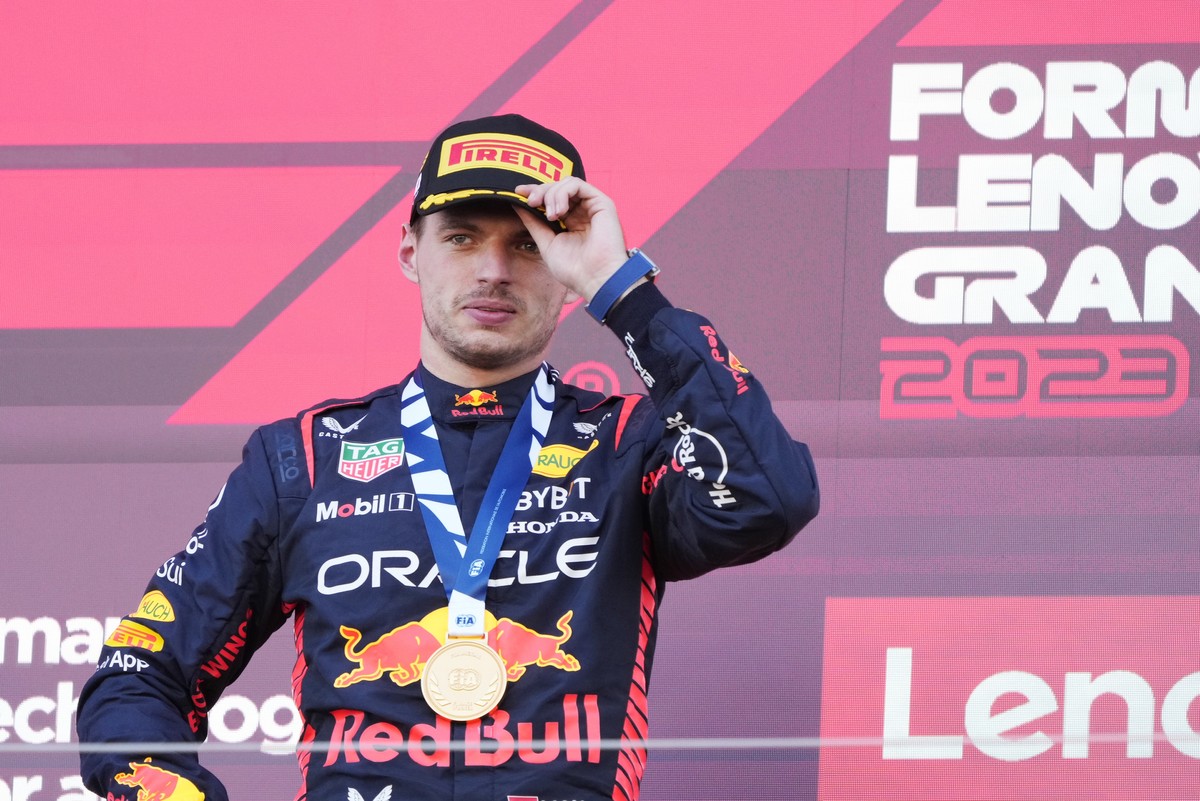 epa10879983 Dutch Formula One driver Max Verstappen of Red Bull Racing adjusts his cap after winning the Formula One Japanese Grand Prix at Suzuka Circuit racetrack in Suzuka, Japan, 24 September 2023 ...