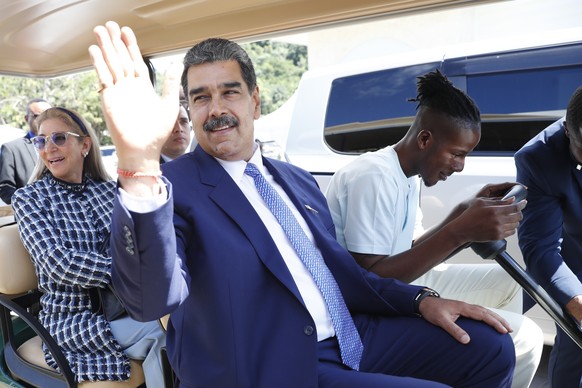 epa11191782 Venezuelan President Nicolas Maduro (C) waves after the first meeting of the 8th summit of the Community of Latin American and Caribbean States (CELAC) in Kingstown, Saint Vincent and the  ...