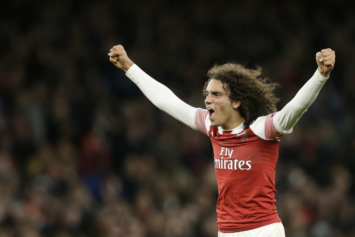 Arsenal's Matteo Guendouzi applauds fans at the end of the English Premier League soccer match between Arsenal and Tottenham Hotspur at the Emirates Stadium in London, Sunday Dec. 2, 2018. (AP Ph ...