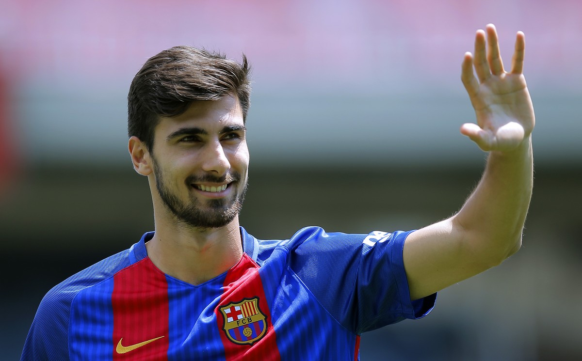 FC Barcelona's new signing Andre Gomes gestures during his official presentation at the Mini Stadi stadium in Barcelona, Spain, Wednesday, July 27, 2016. Barcelona has signed Portugal midfielder  ...