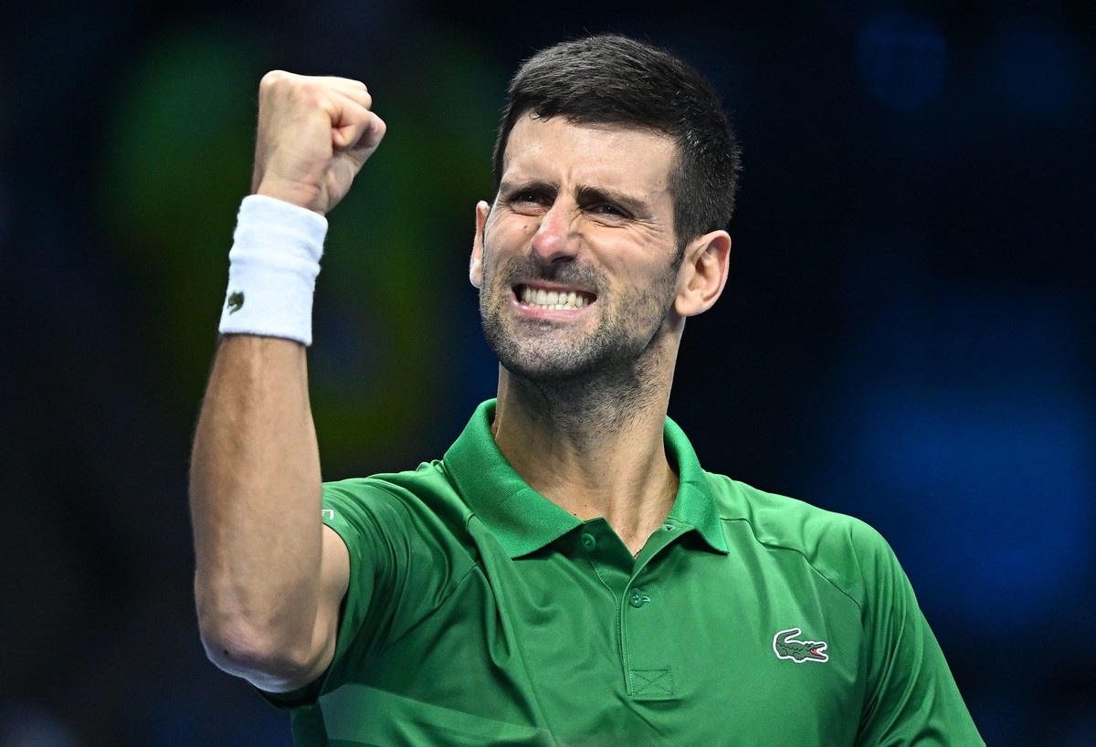 epaselect epa10306066 Novak Djokovic of Serbia celebrates after winning the match against Stefanos Tsitsipas of Greece at the Nitto ATP Finals 2022 tennis tournament at the Pala Alpitour arena in Turi ...