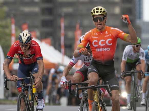 Greg Van Avermaet, riding for UCI WorldTeam CCC, celebrates his victory at the Grand Prix Cycliste de Montréal on Sunday, September 15, 2019. (Peter McCabe/The Canadian Press via AP)