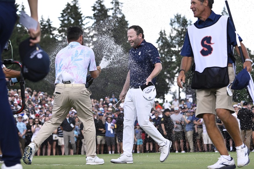 epa10048838 Branden Grace of South Africa celebrates on the eighteenth hole, during the third round of the LIV Golf Invitational Series at Pumpkin Ridge Golf Club in North Plains, Oregon, USA, 02 July ...