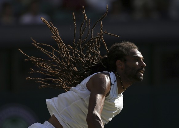 Germany&#039;s Dustin Brown returns to Britain&#039;s Andy Murray during their Men&#039;s Singles Match on day three at the Wimbledon Tennis Championships in London Wednesday, July 5, 2017. (AP Photo/ ...