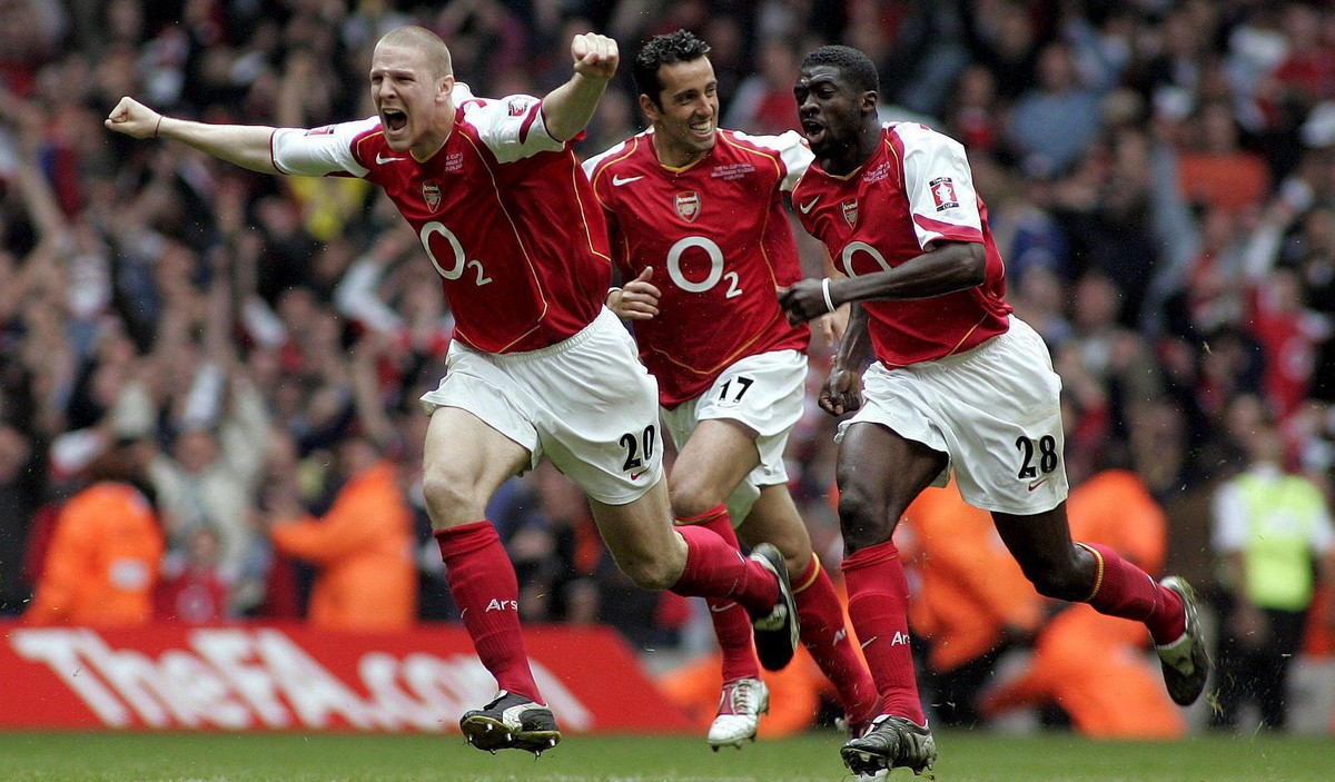 Arsenal's Philippe Senderos (L) leads the celebrations followed by Edu and Kolo Toure in the FA Cup Final at the Millennium Stadium, Cardiff, 21 May, 2005. Arsenal won the FA Cup for the 10th tim ...
