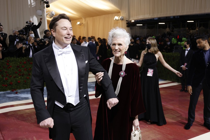epa09923469 Elon Musk and Maye Musk on the red carpet for the 2022 Met Gala, the annual benefit for the Metropolitan Museum of Art's Costume Institute, in New York, New York, USA, 02 May 2022. Th ...