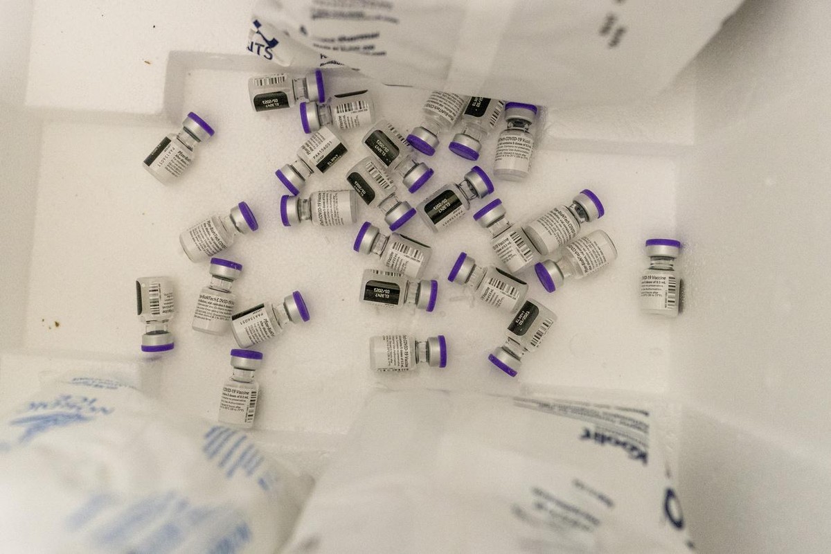 Vials with the Pfizer-BioNTech COVID-19 Vaccine are seen in a cooler before being thawed at a pop-up COVID-19 vaccination site at St. Luke's Episcopal Church, Tuesday, Jan. 26, 2021, in the Bronx ...