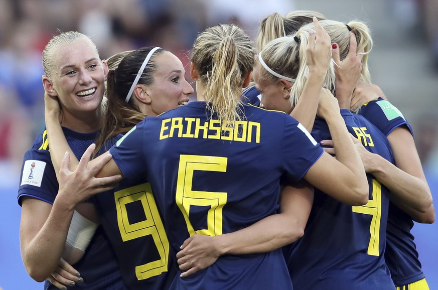 Sweden&#039;s Stina Blackstenius, left, with teammates celebrates after scoring her side&#039;s second goal during the of the Women&#039;s World Cup quarterfinal soccer match between Germany and Swede ...